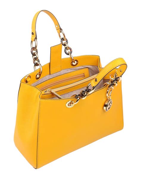 MICHAEL Michael Kors Yellow Handbags + FREE SHIPPING .